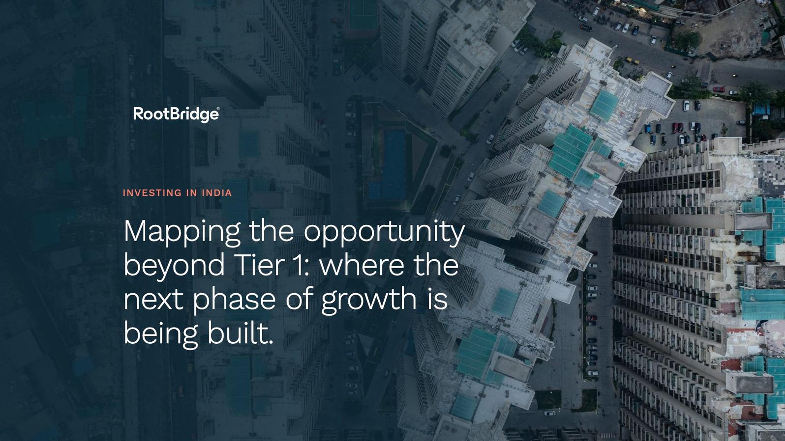 Aerial view of high-rise residential towers and streets in an Indian city, overlaid with the RootBridge headline “Mapping the opportunity beyond Tier 1: where the next phase of growth is being built”